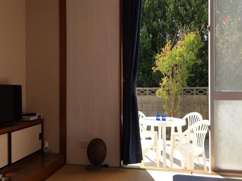 Guesthouse Seagull Village Motobu Exterior photo