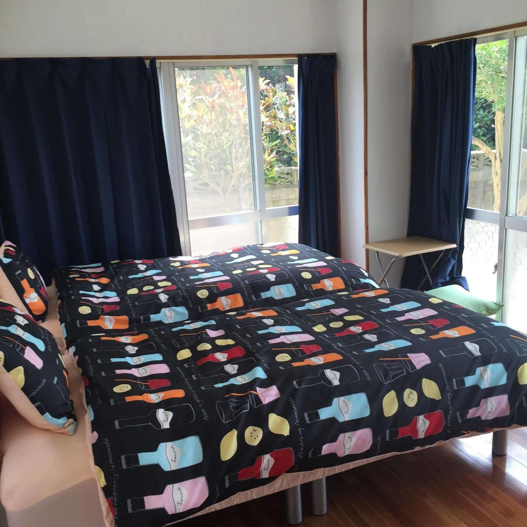 Guesthouse Seagull Village Motobu Exterior photo