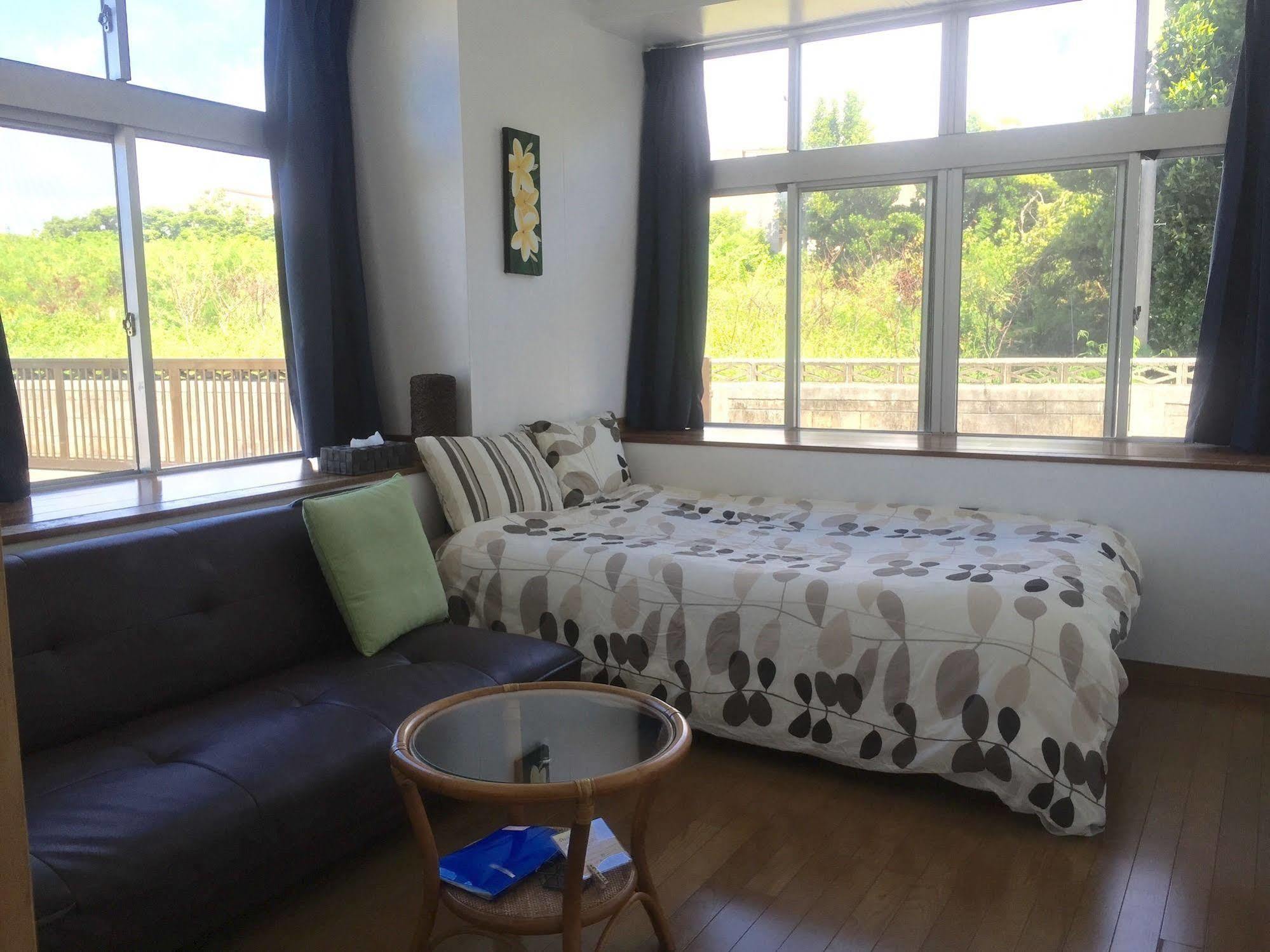 Guesthouse Seagull Village Motobu Exterior photo